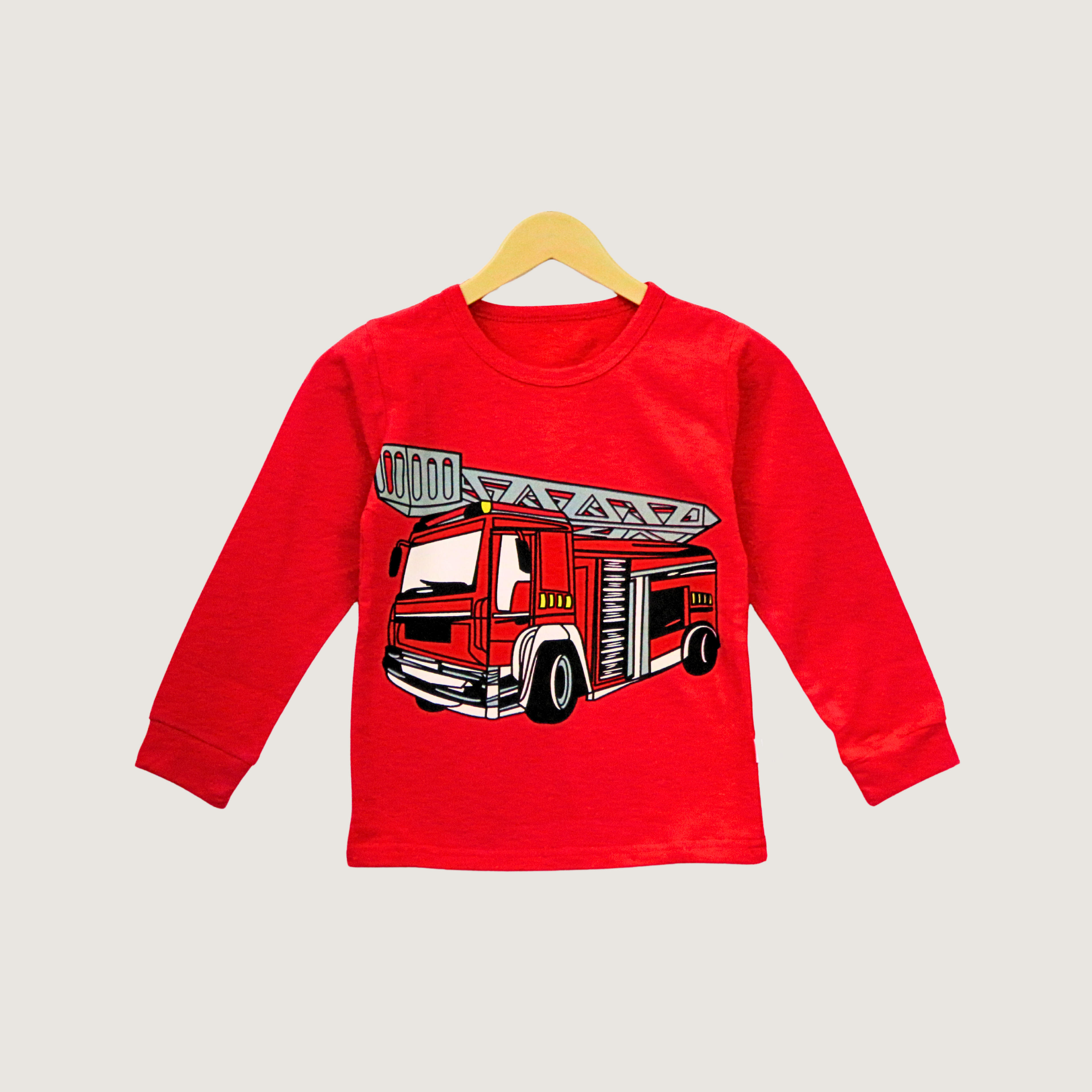 Red long-sleeve shirt with a fire truck design on a white background
