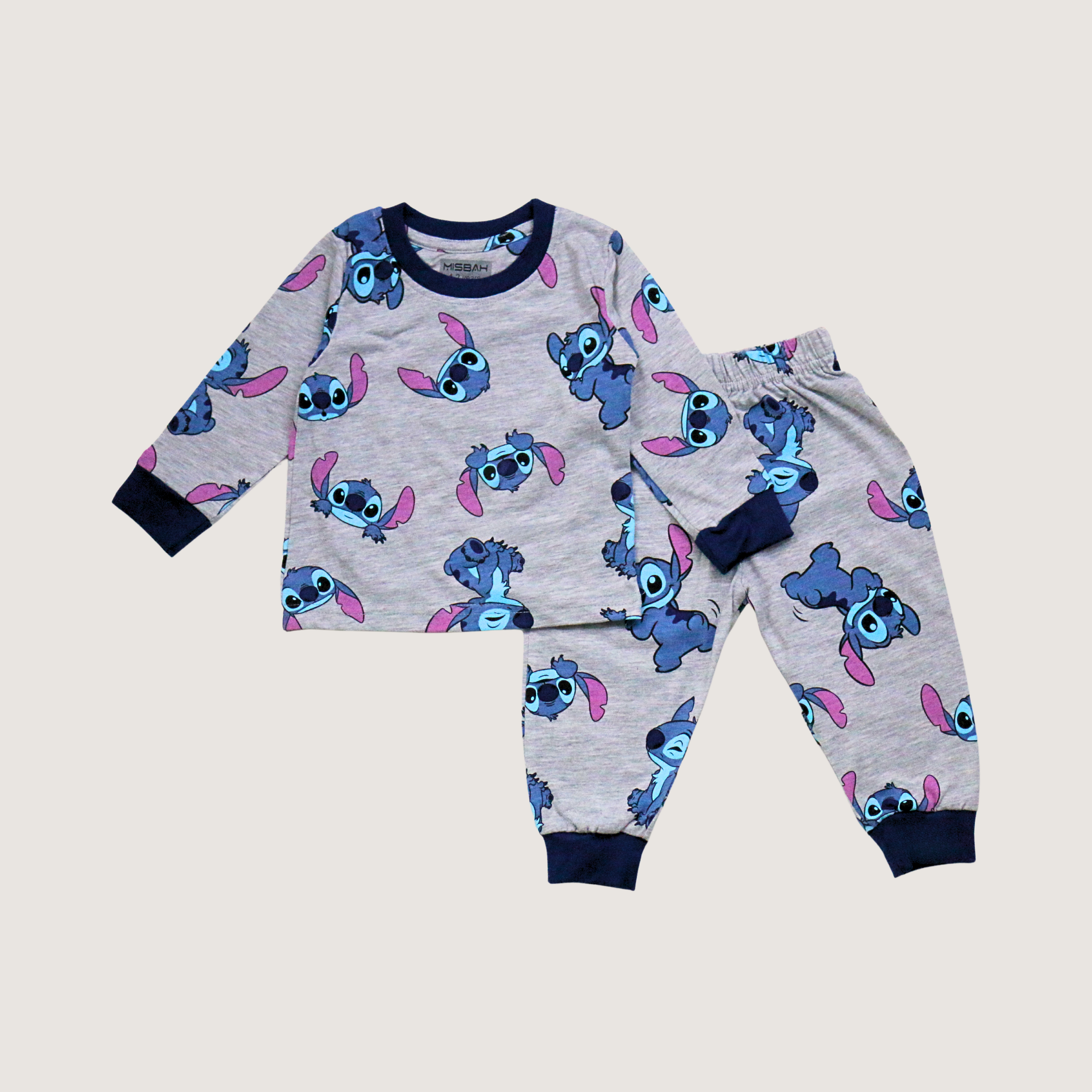 Children's pajama set with cartoon character on a light gray background