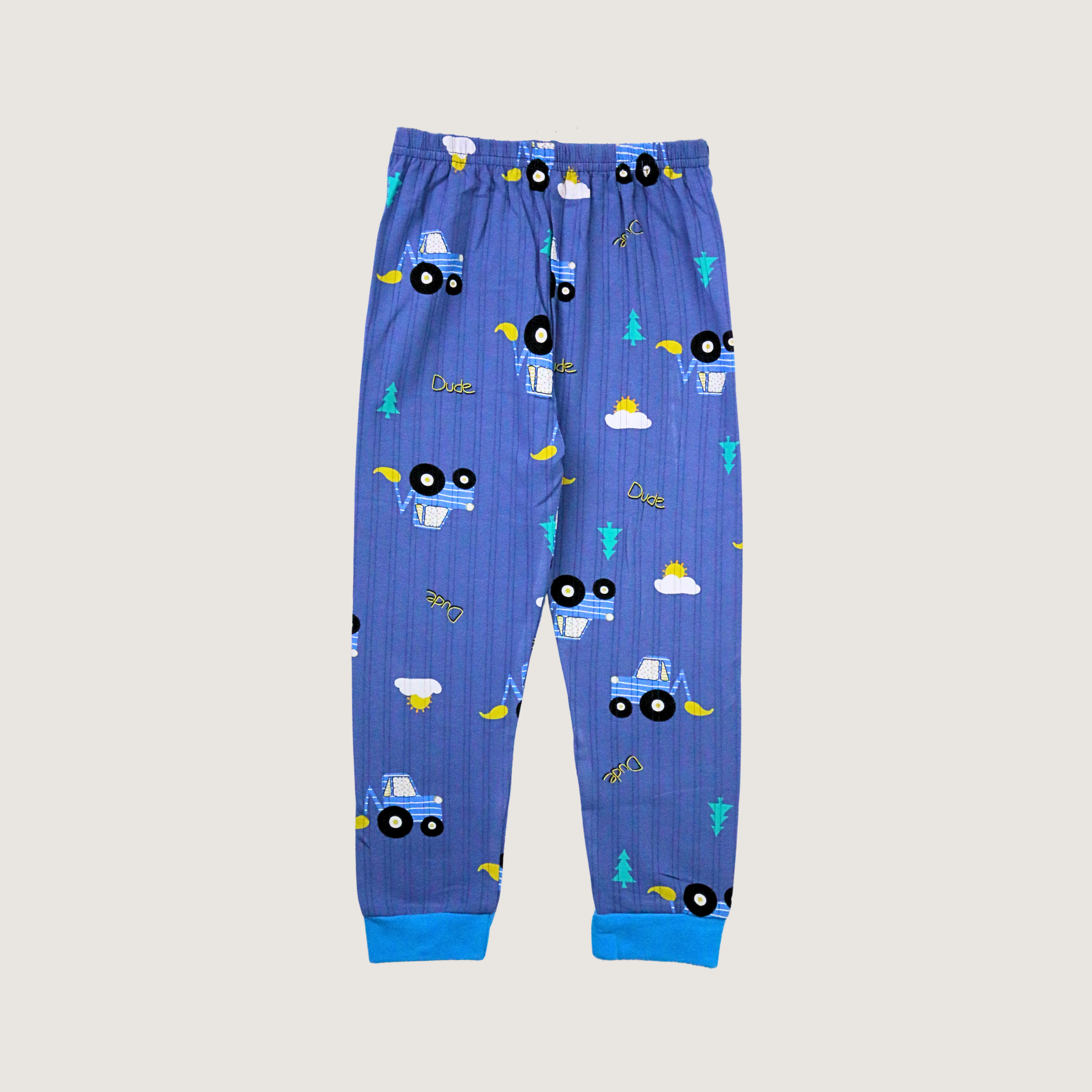 Blue children's pants with truck pattern on a light gray background