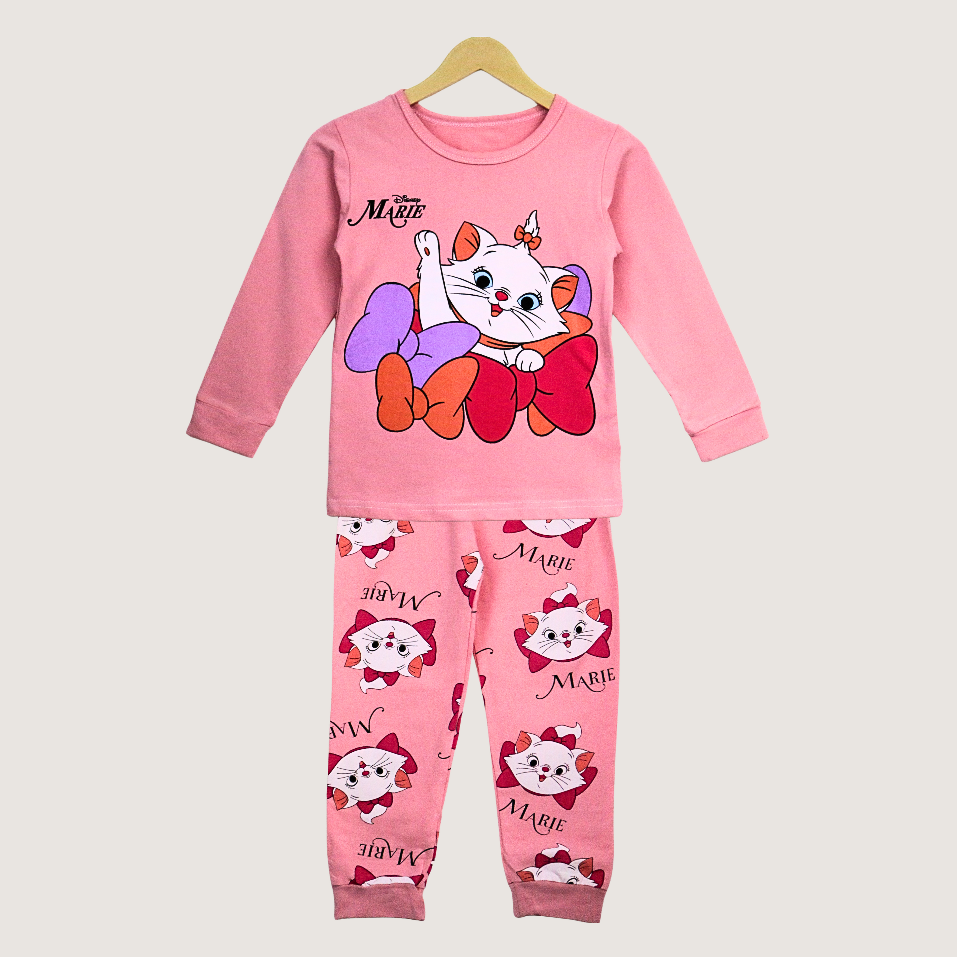 Pink children's pajama set with cartoon character on a white background