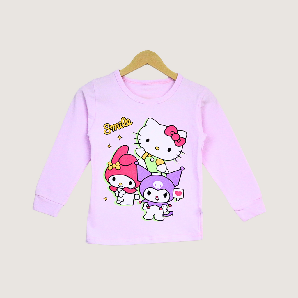 Pink long-sleeve shirt with cartoon characters on a beige background