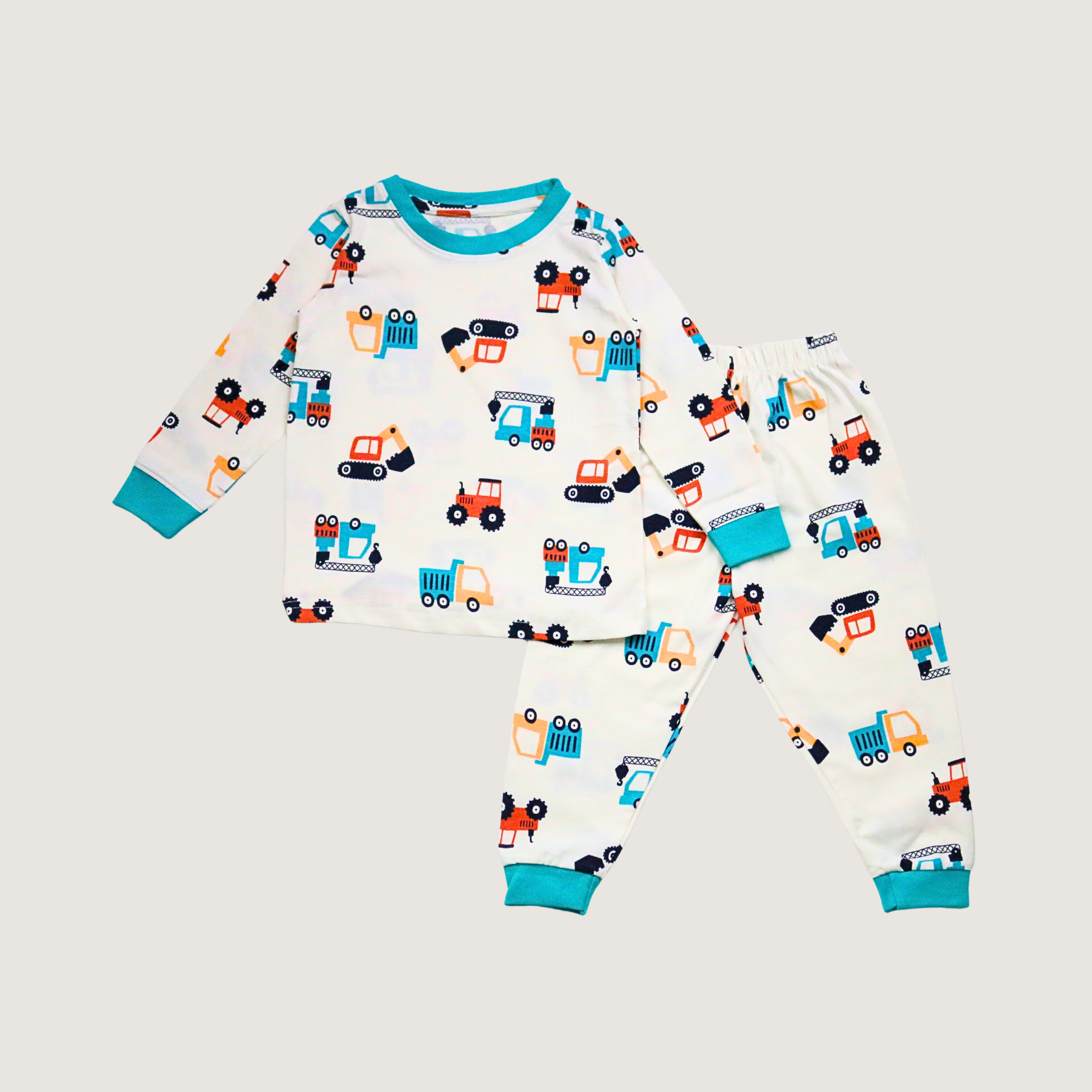Children's onesie with vehicle pattern on a light gray background