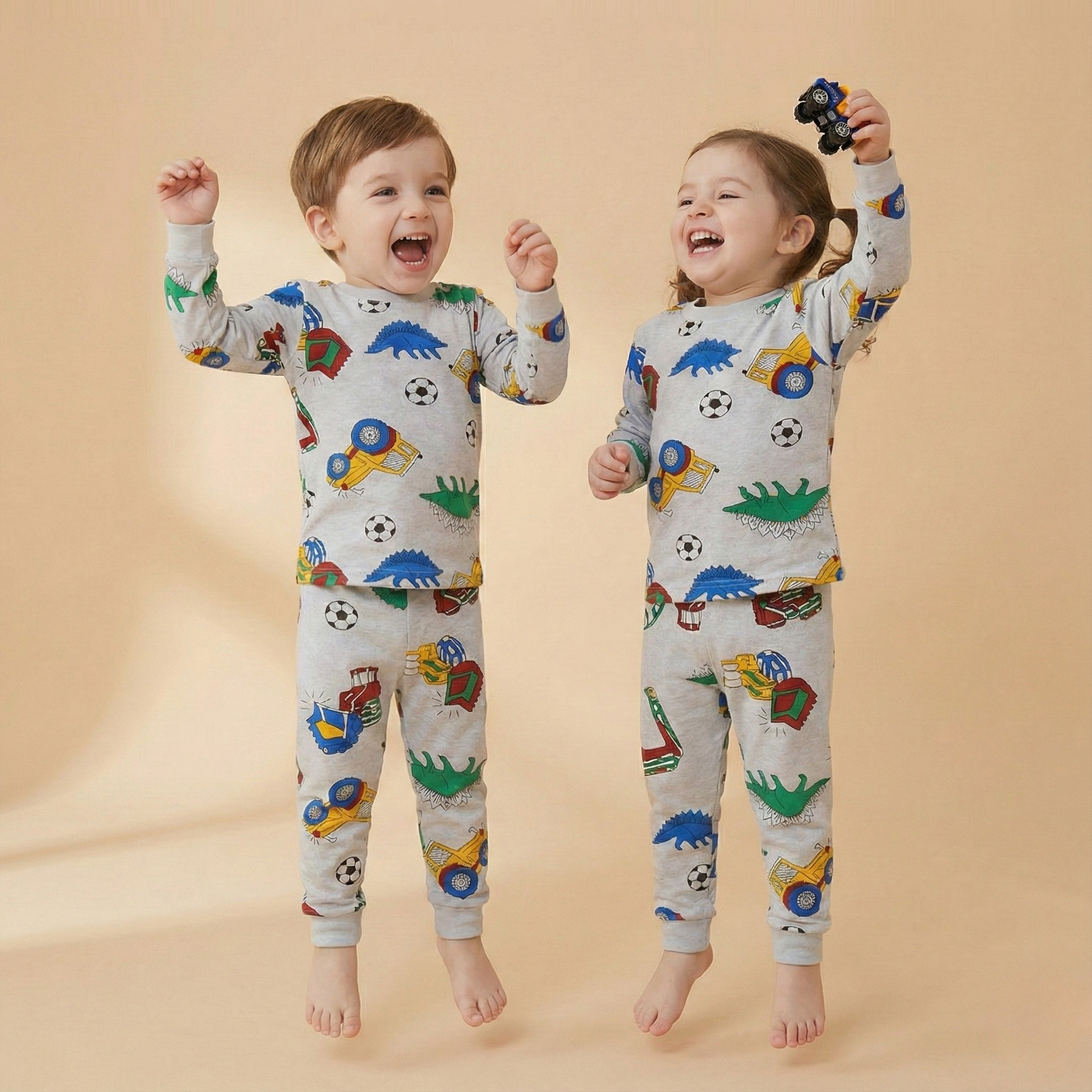 بيجاما حرارية بأكمام طويلة بتصميم ديناصور وجرار وكرة قدم (للجنسين)