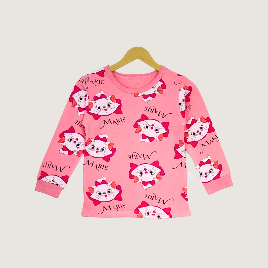 Pink long-sleeve shirt with cat print on a hanger against a light gray background