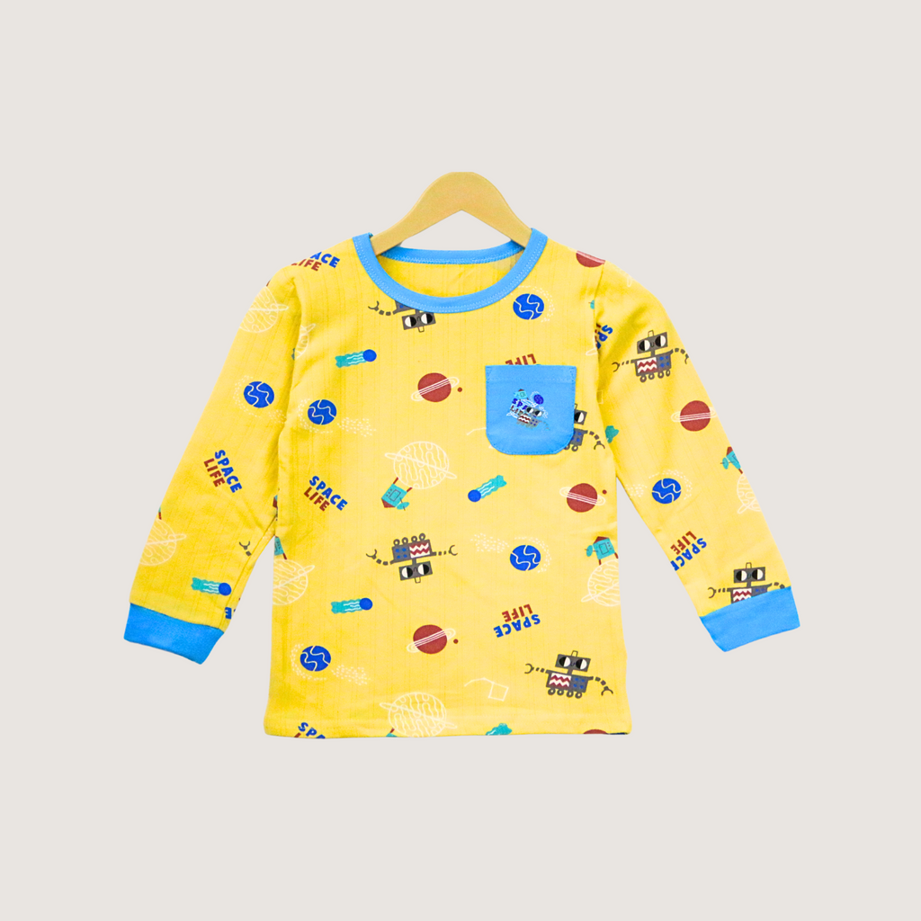 Yellow long-sleeve shirt with space-themed design on a beige background