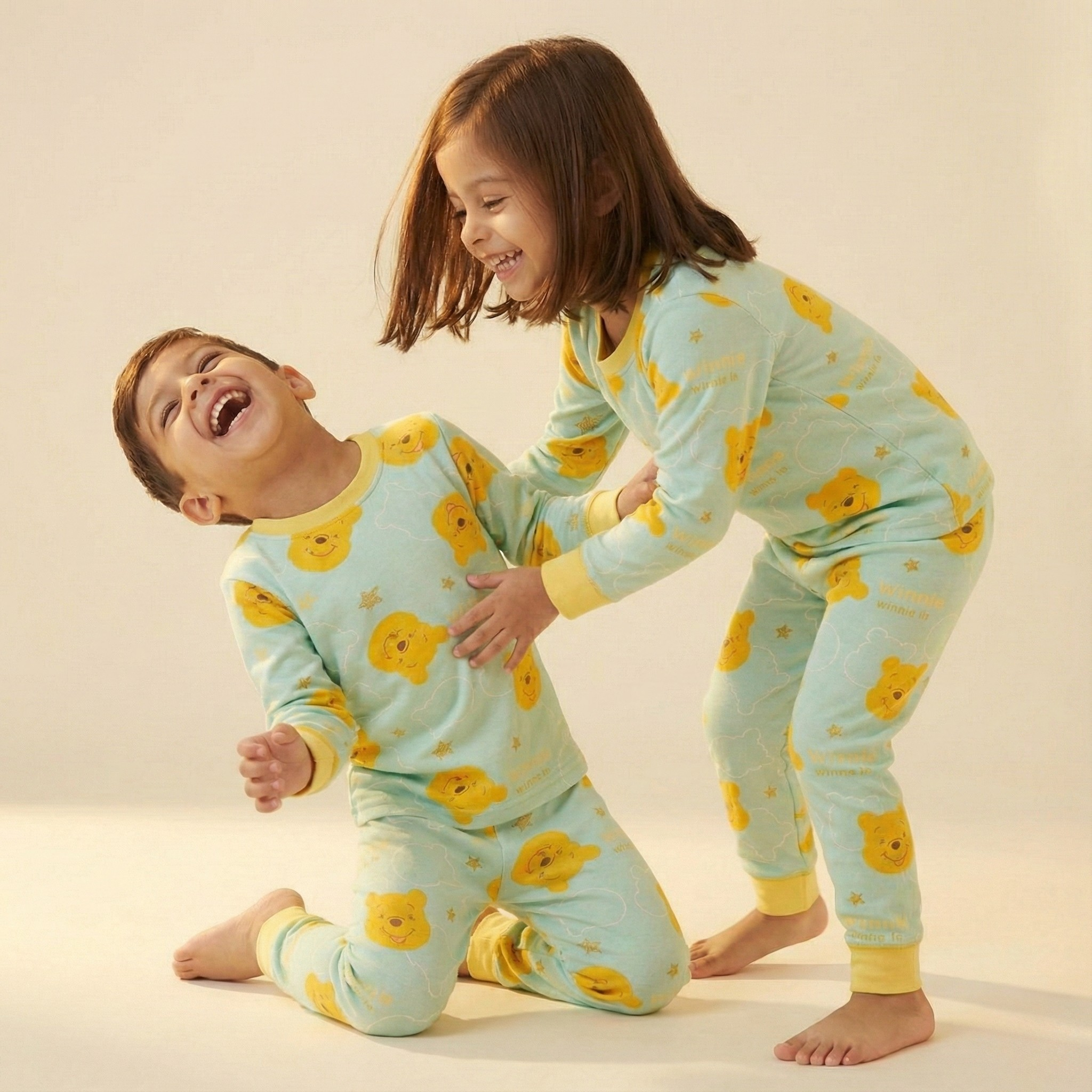 بيجاما حرارية بأكمام طويلة بتصميم ويني الدبدوب (للجنسين)