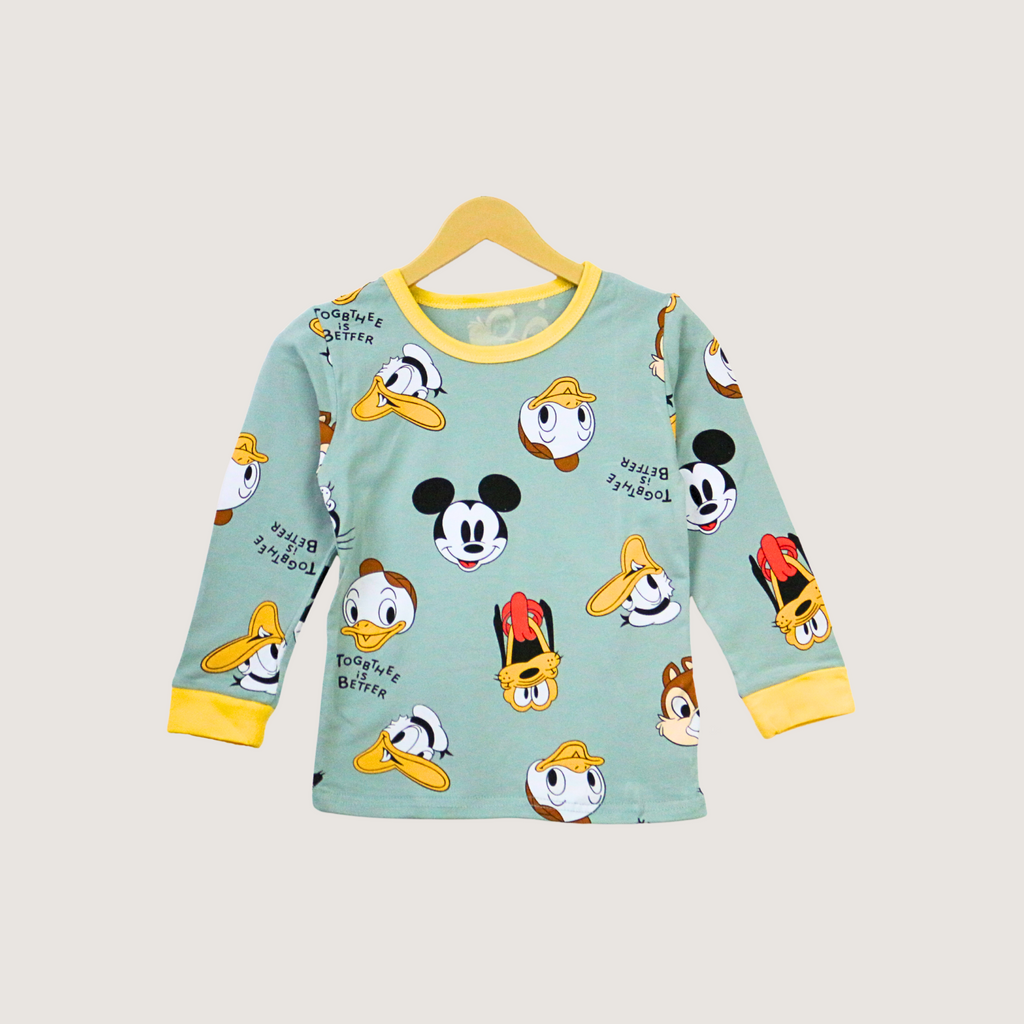 Children's long-sleeve shirt with cartoon character print on a hanger against a white background