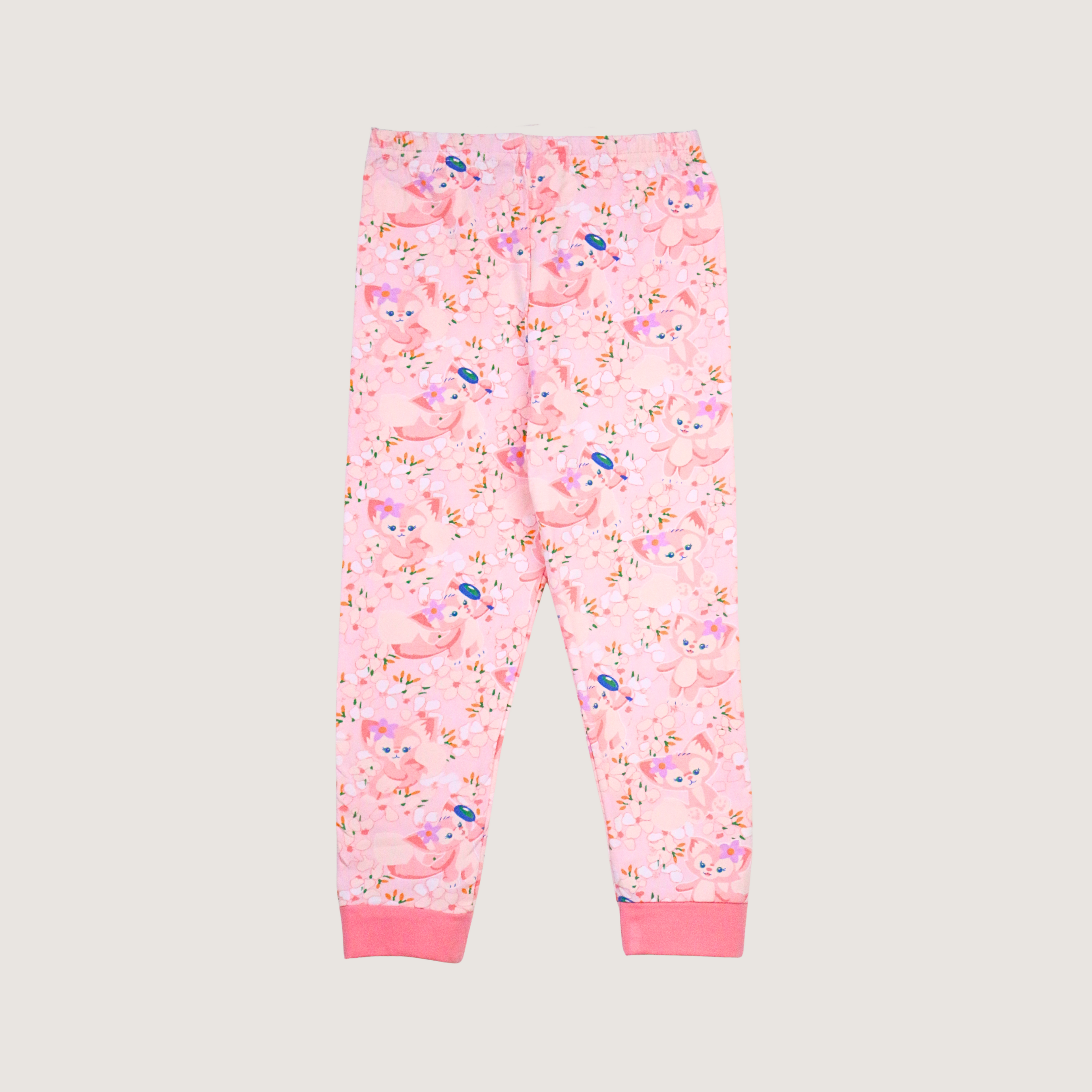 Pink children's leggings with floral and animal pattern on a light gray background