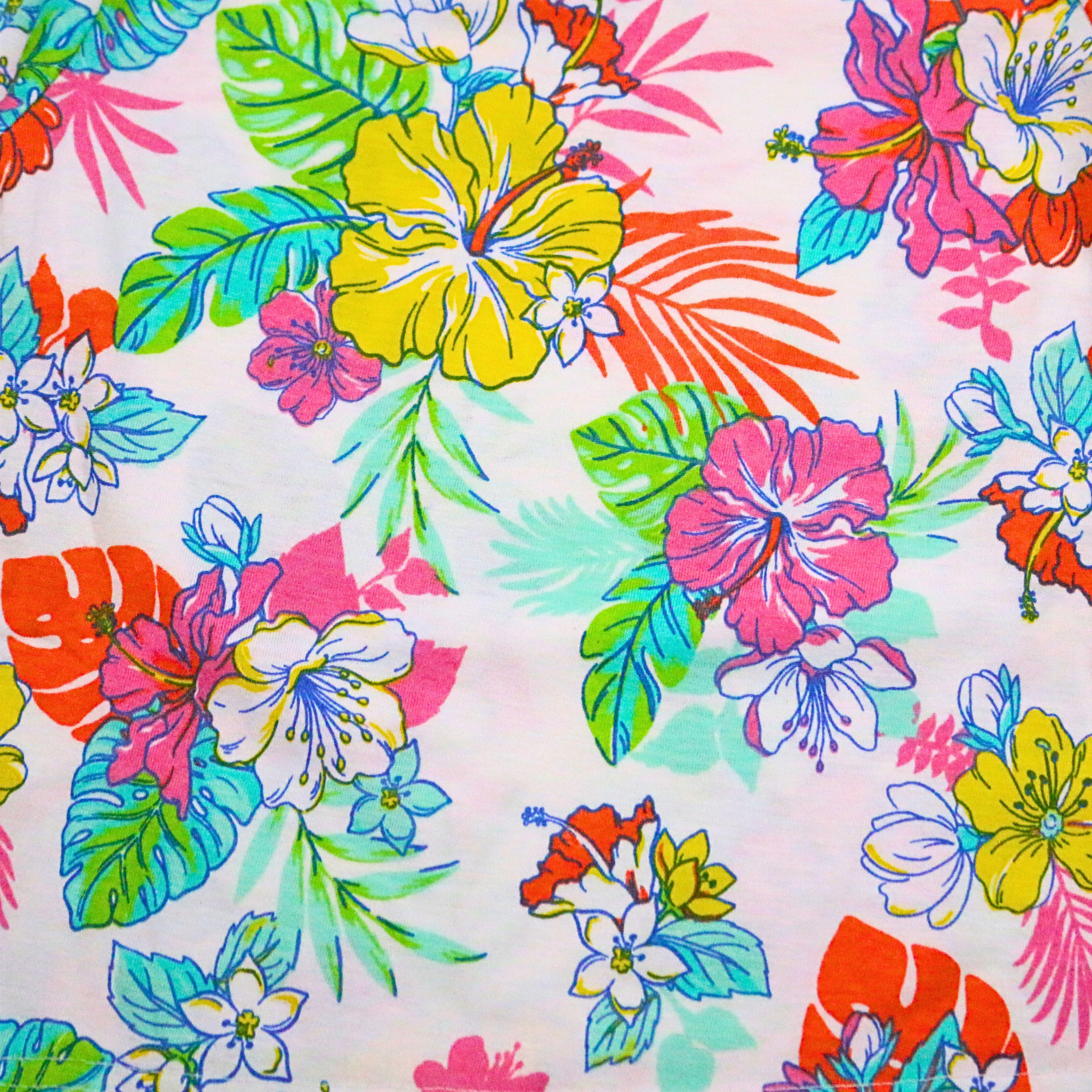 Colorful tropical flower pattern on a white background