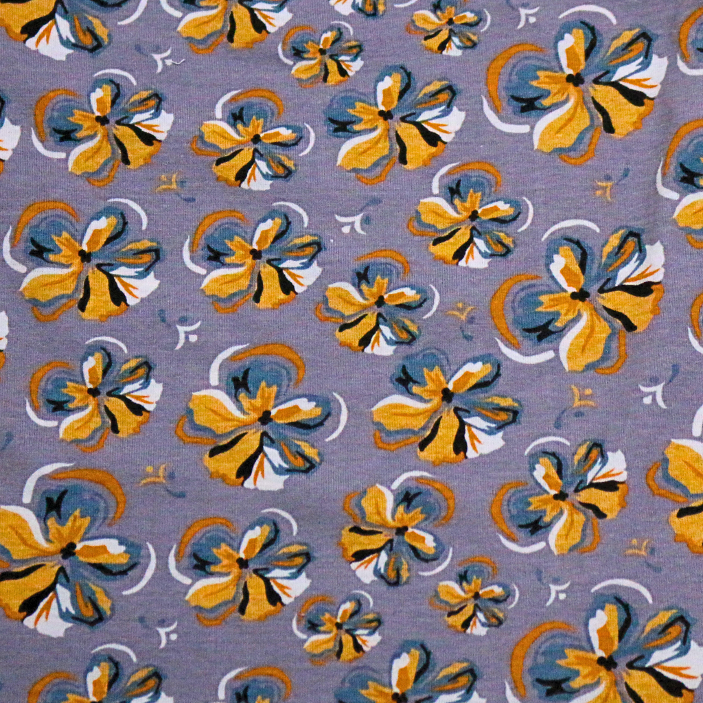 Floral pattern with yellow and blue flowers on a gray background