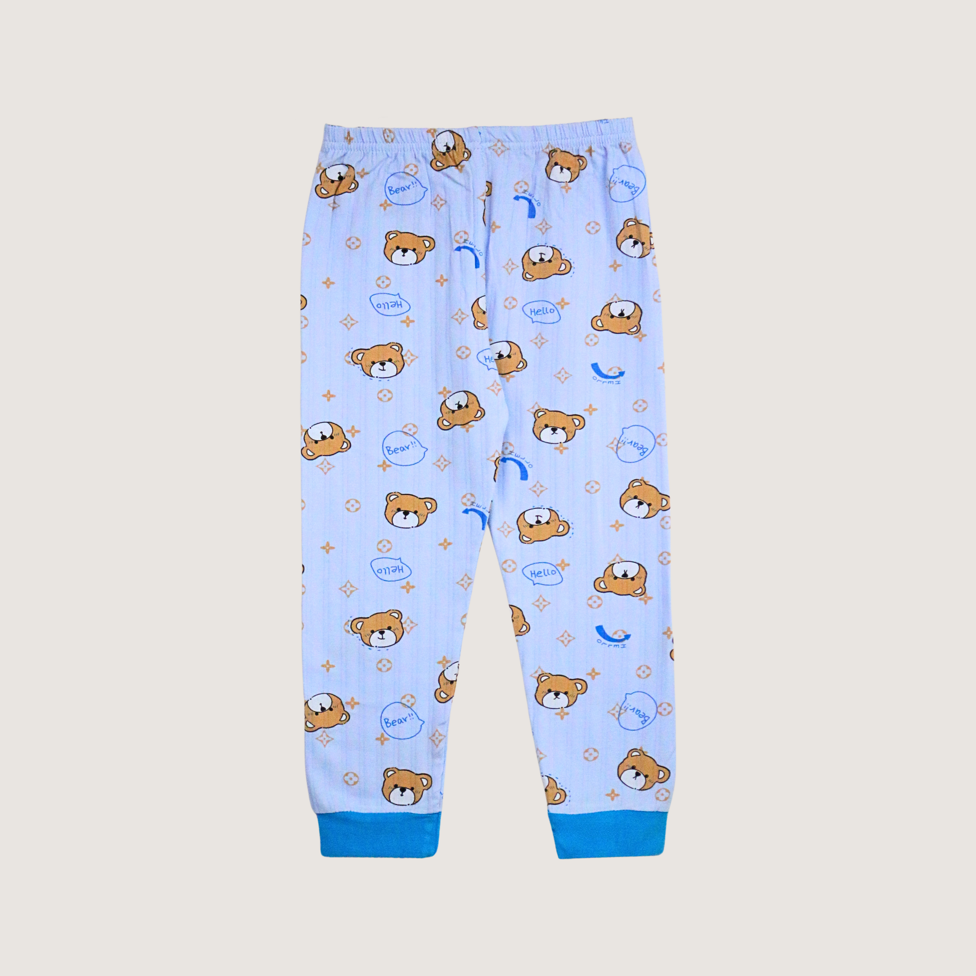 Children's pajama pants with teddy bear pattern on a light blue background