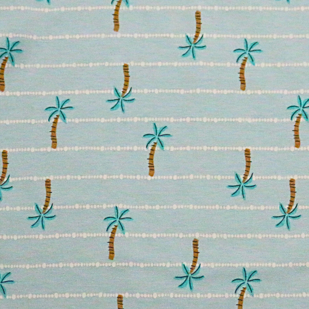 Pattern of palm trees and coconuts on a light blue background