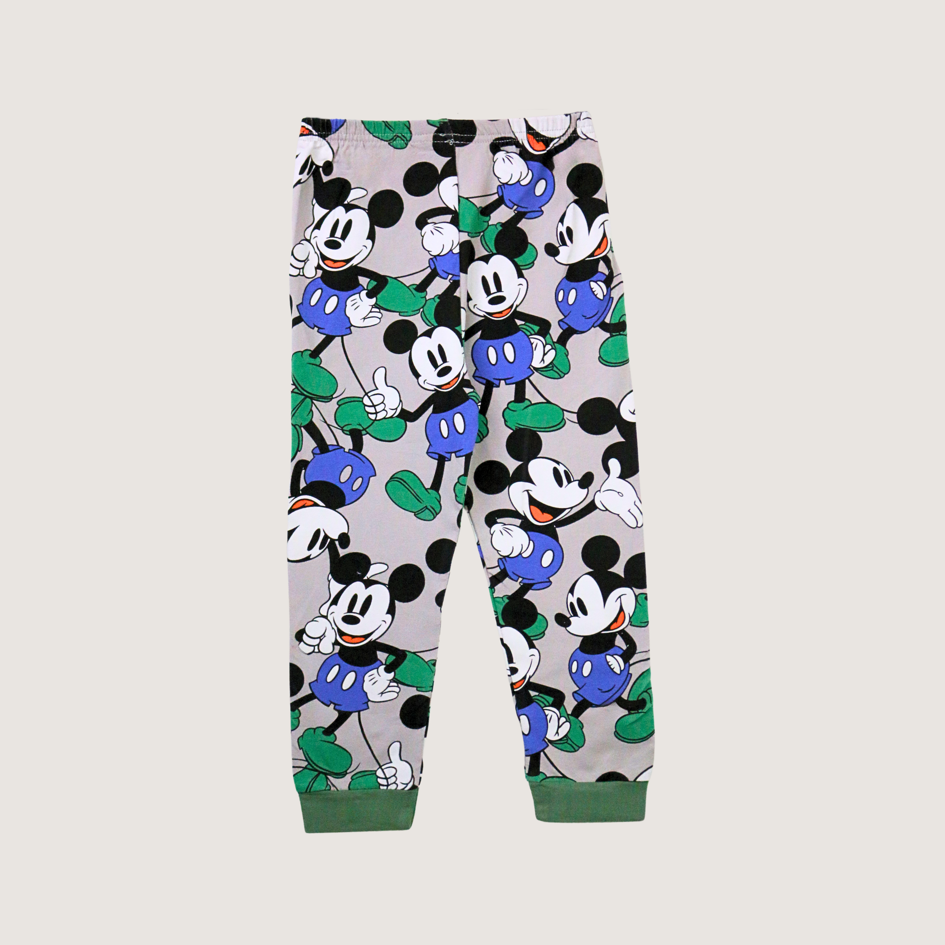 Pajama pants with Mickey Mouse pattern on a light gray background