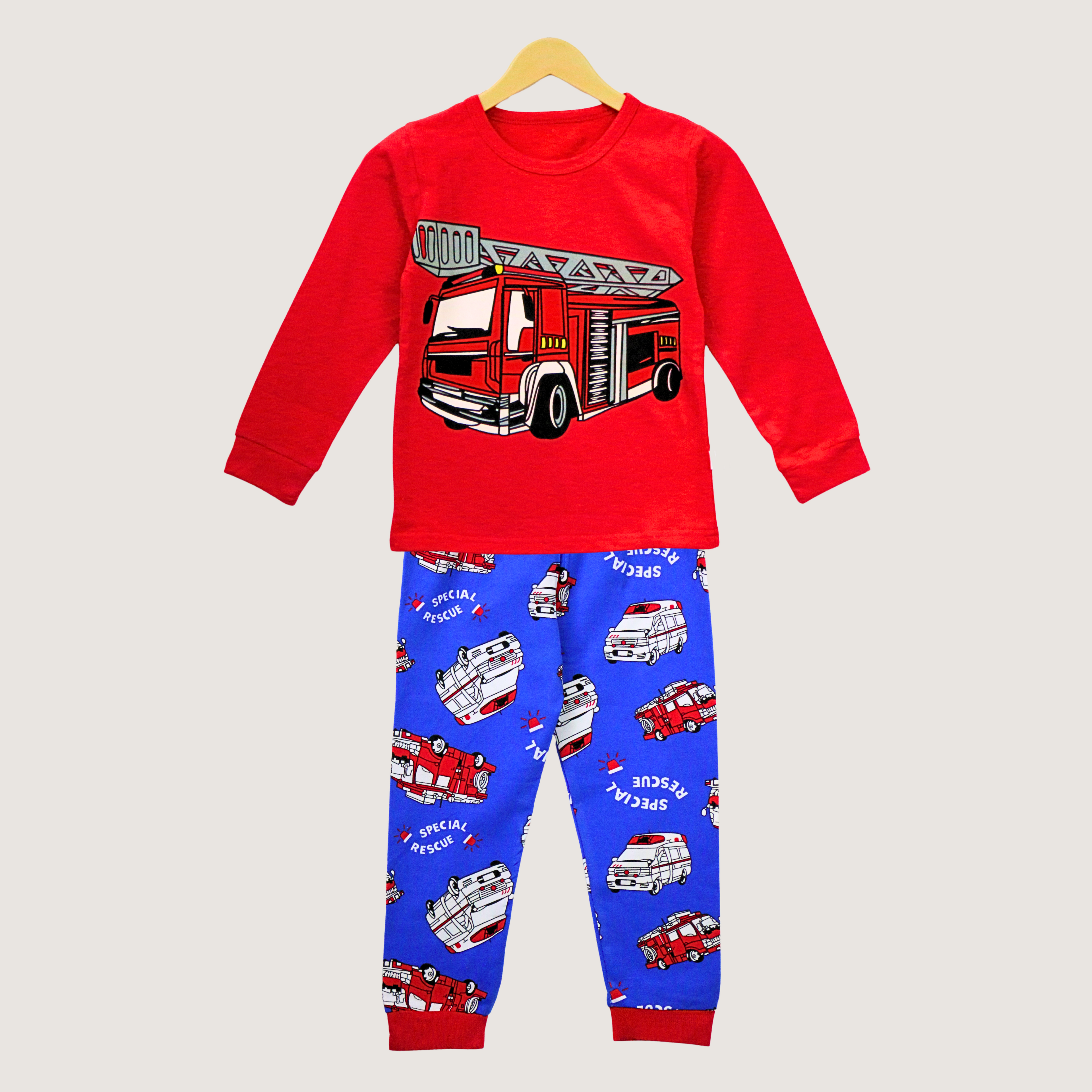 Red long-sleeve shirt and blue pants with fire truck design on a white background