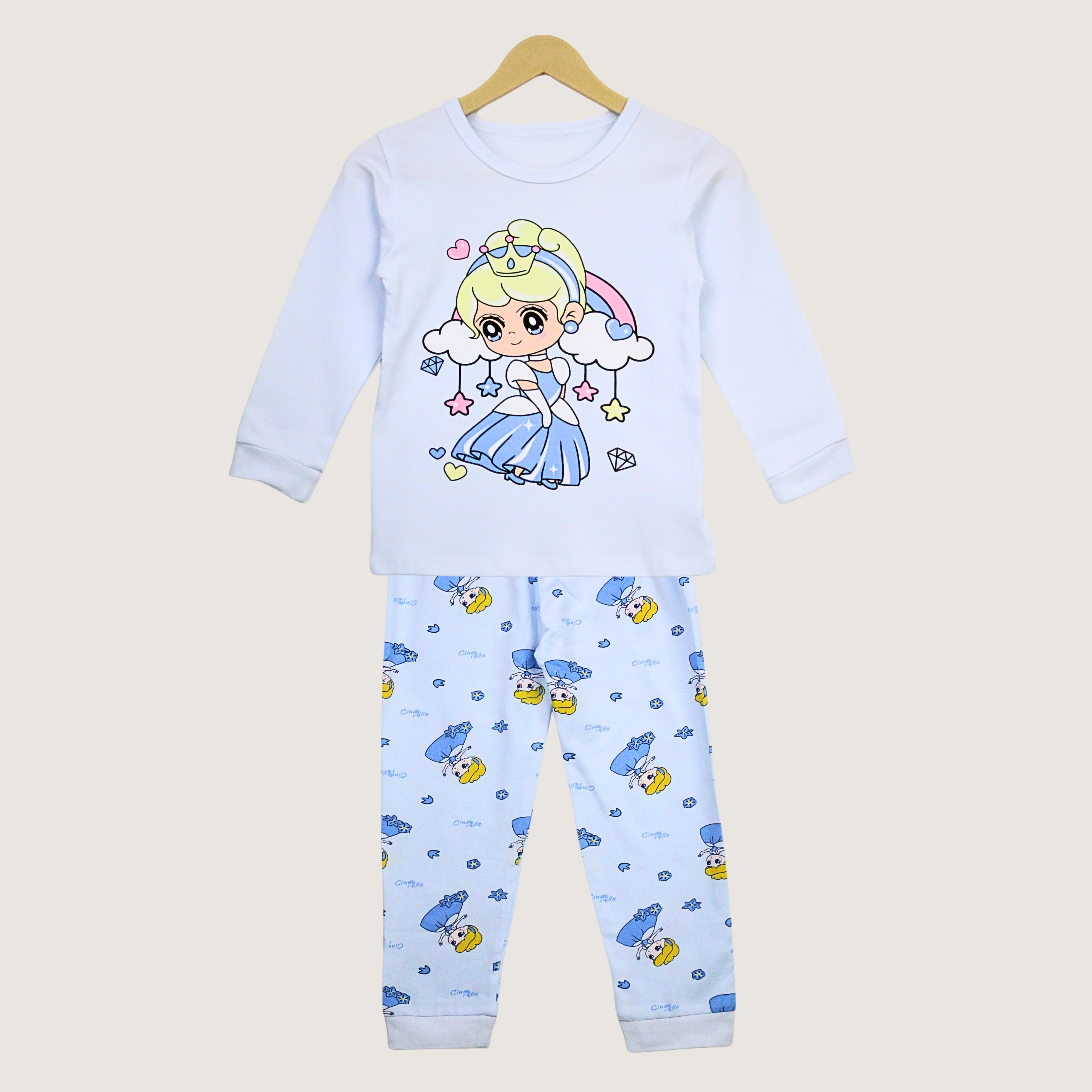 Children's pajama set with cartoon character on a beige background