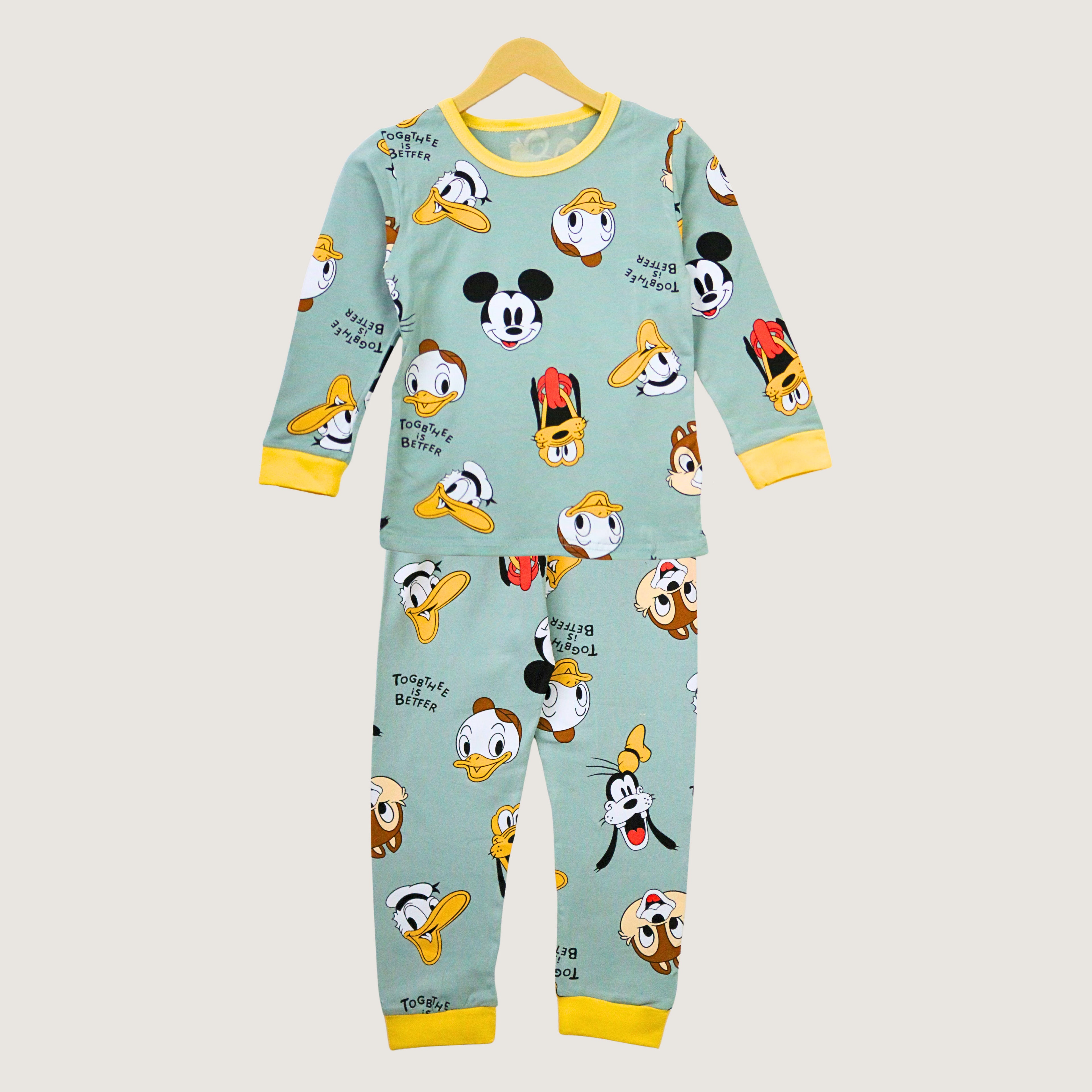 Children's pajama set with cartoon character print on a light blue background