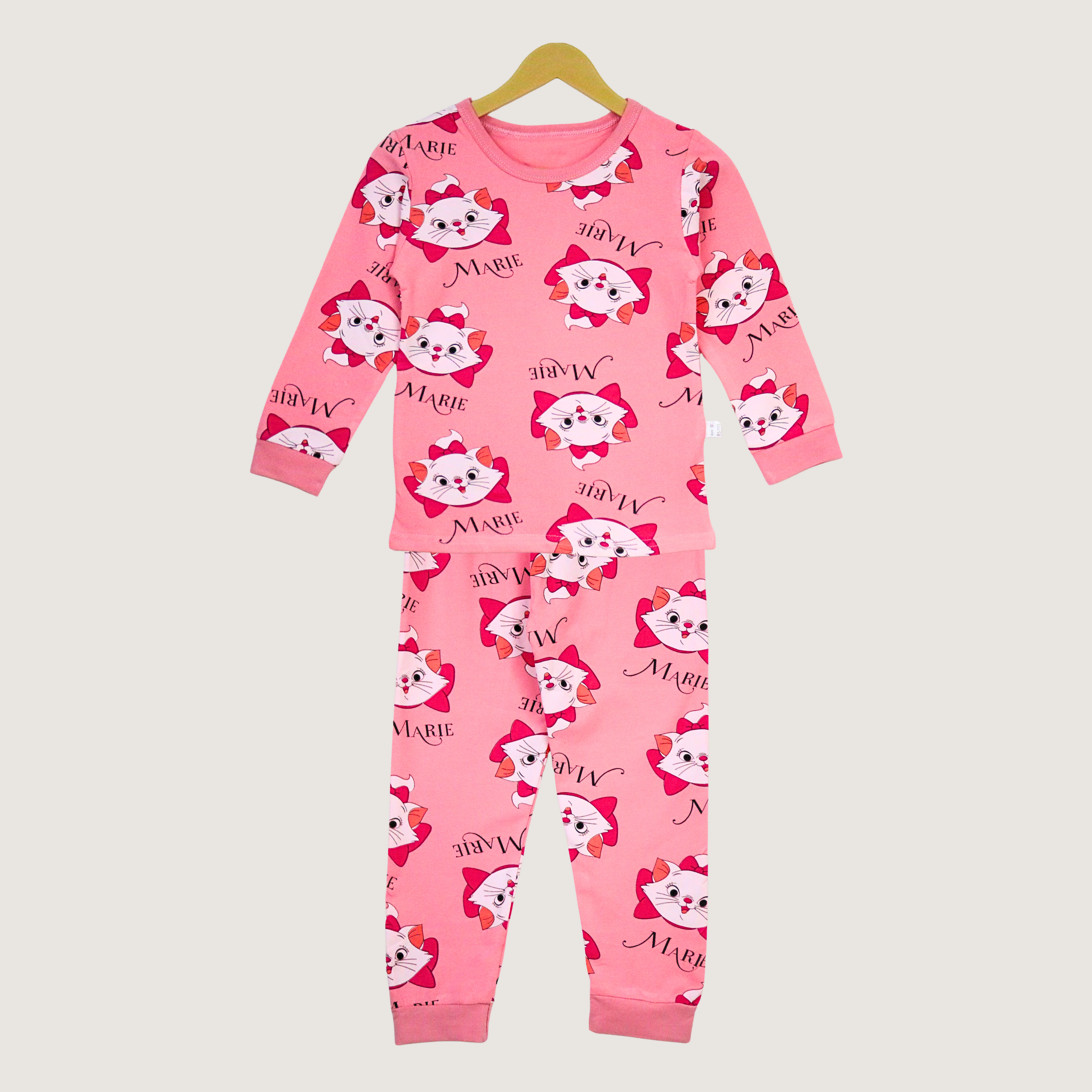 Pink children's pajama set with cartoon character on a white background