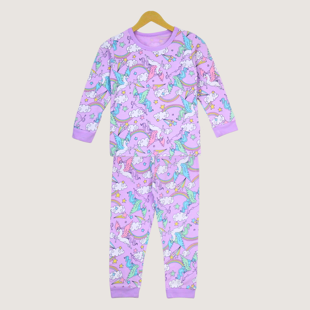 Children's onesie with unicorn and rainbow pattern on a beige background