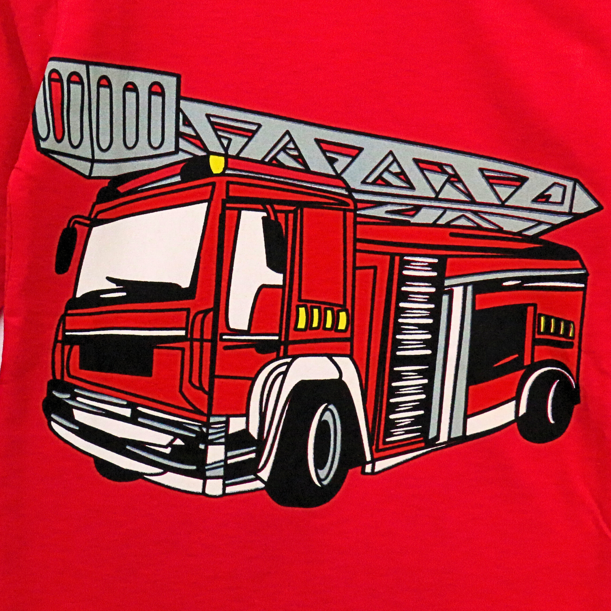 Red t-shirt with a graphic of a fire truck on a red background