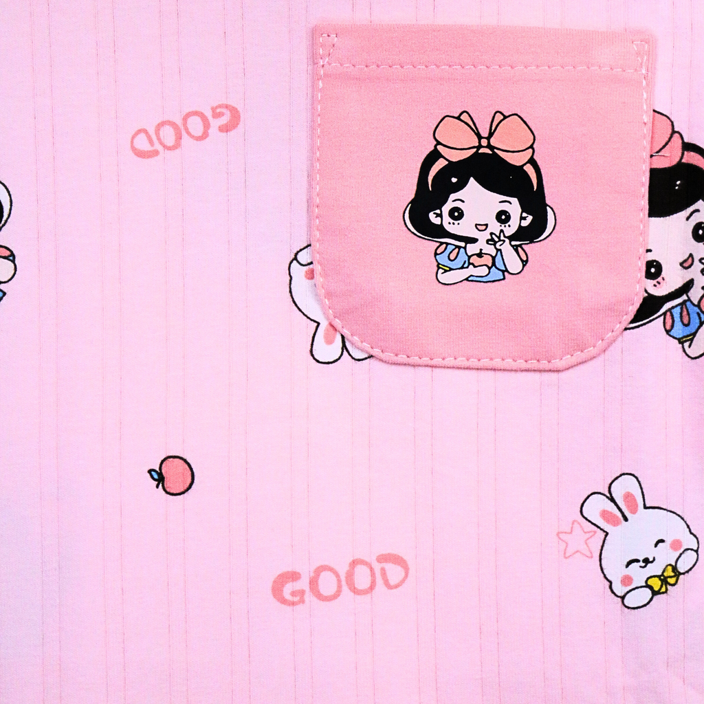 Pink fabric with cartoon character and 'GOOD' text on a pink background