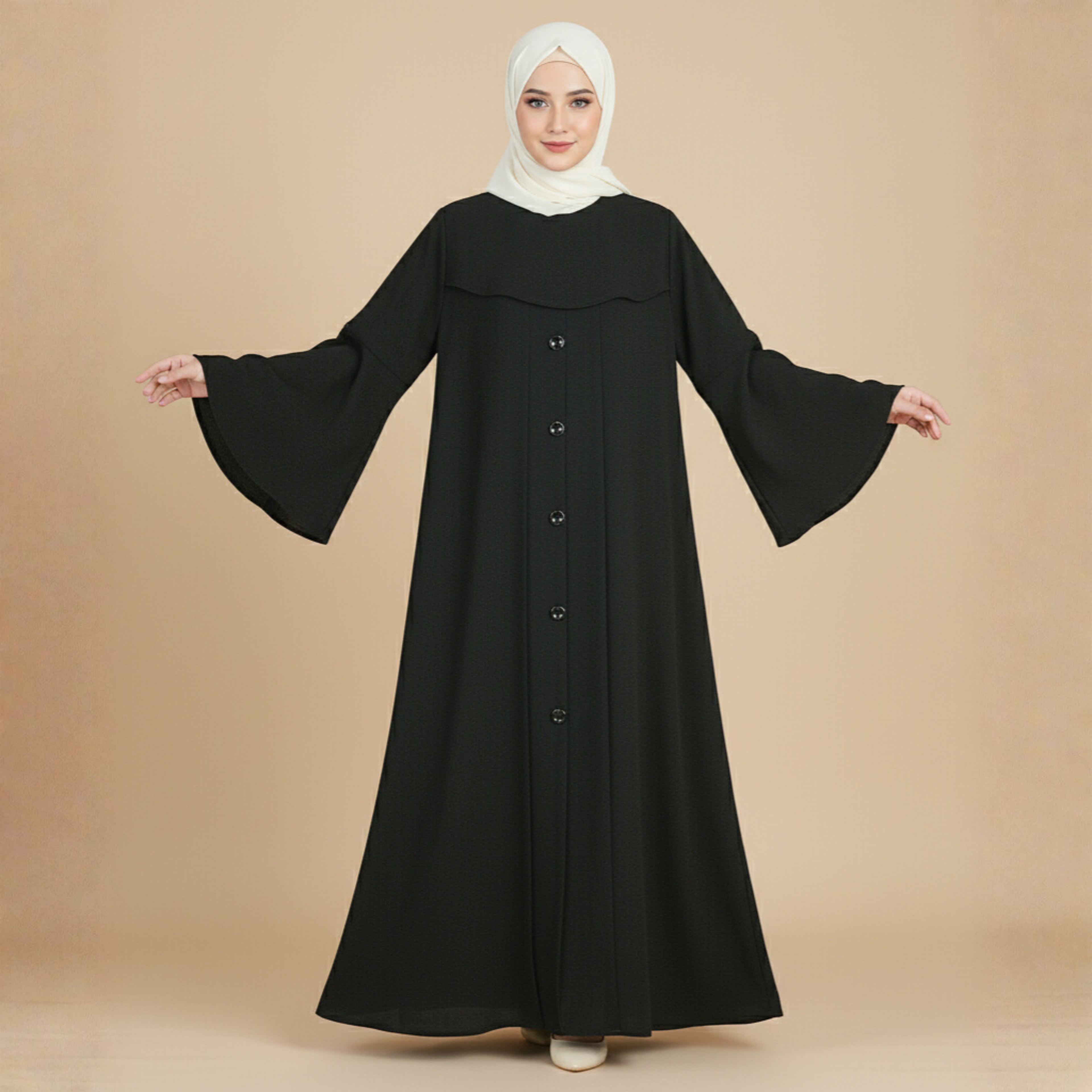 Woman wearing a black abaya with bell sleeves on a beige background
